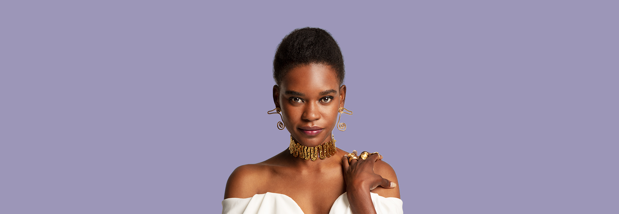 A chic woman wearing a statement necklace