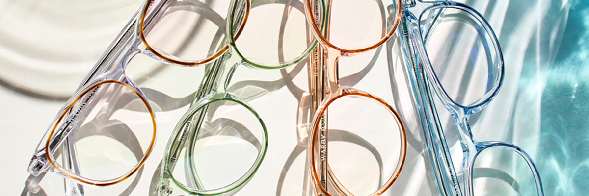 4 pairs of colorful Warby Parker glasses